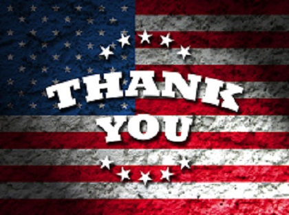 Thank you sign in front of USA flag